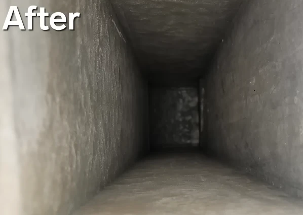 Interior of AC duct fully cleaned, clear passage restoring airflow, Bahrain