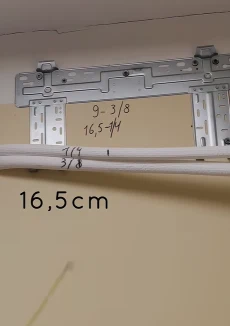New split AC indoor unit freshly mounted on wall, Bahrain